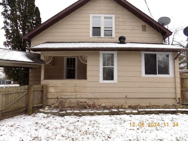 view of snow covered property