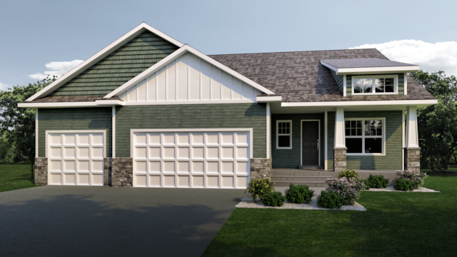 craftsman house with a garage and a front lawn