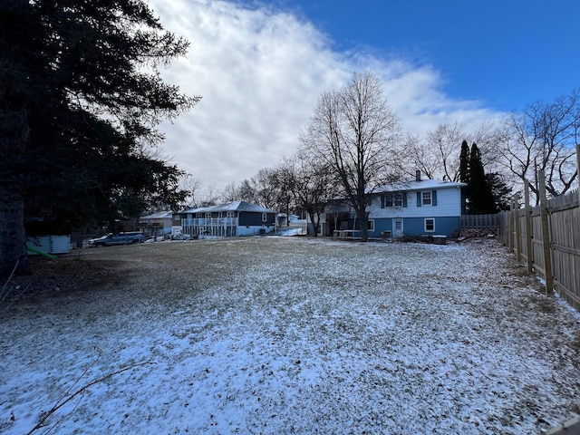 view of yard covered in snow