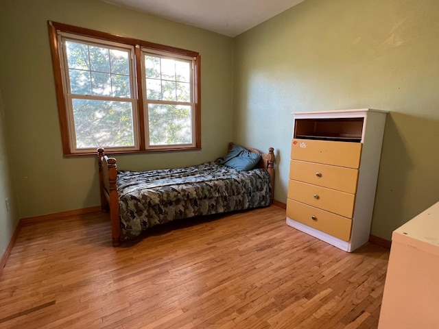 bedroom with light hardwood / wood-style flooring