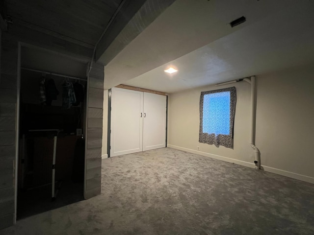 unfurnished bedroom with carpet and a closet