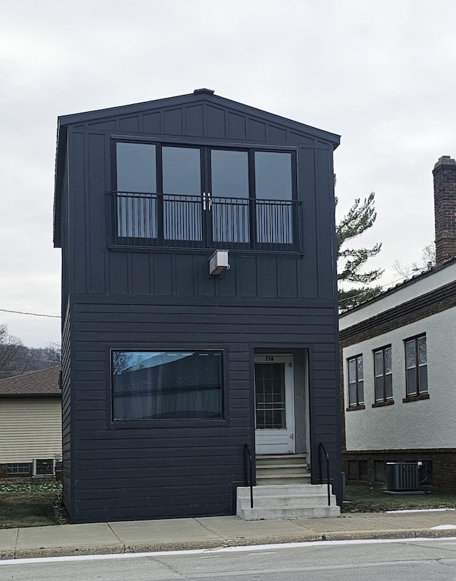 view of property featuring central AC unit