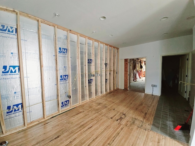 interior space with hardwood / wood-style flooring