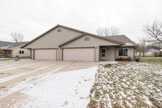 ranch-style home featuring a garage