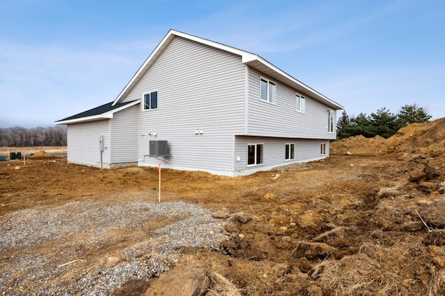 view of home's exterior with central AC unit