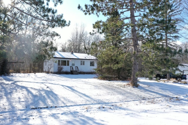 view of snow covered property