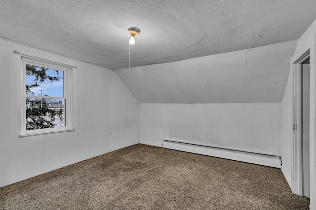 bonus room with carpet flooring, lofted ceiling, a textured ceiling, and a baseboard heating unit