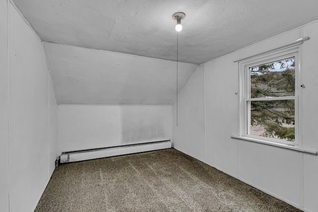 bonus room with carpet flooring, a textured ceiling, lofted ceiling, and a baseboard heating unit