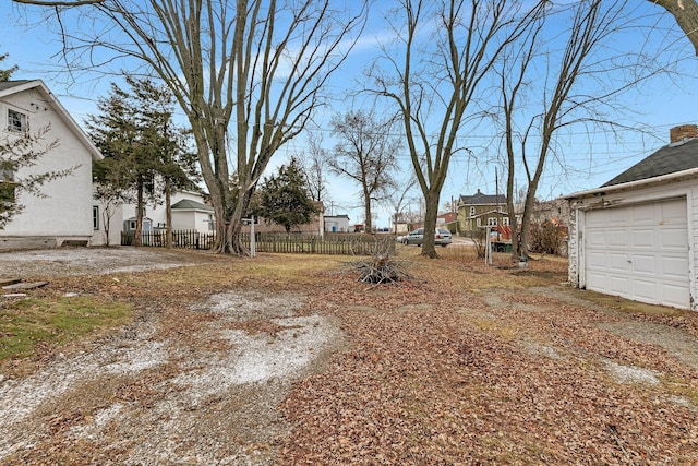 view of yard with a garage