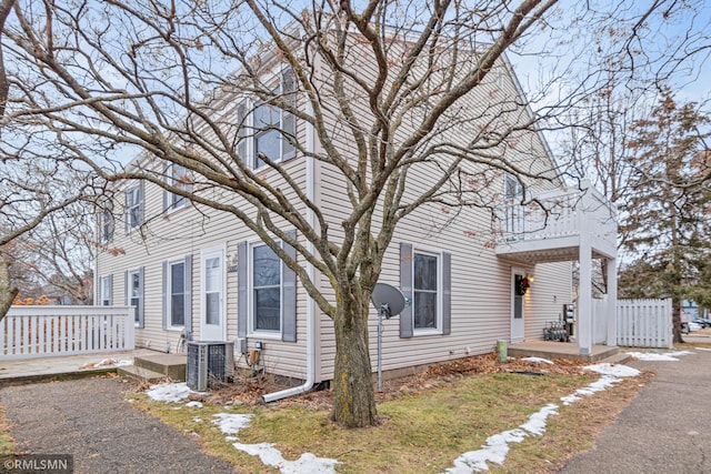 view of front of home with central air condition unit