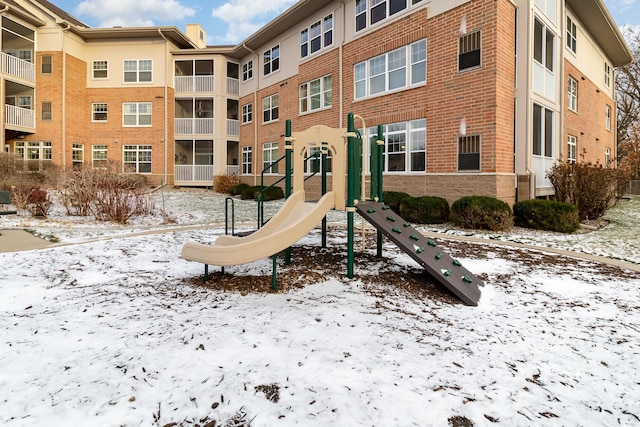 view of snow covered playground