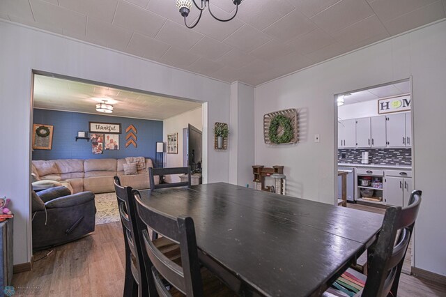 dining area featuring light wood-type flooring