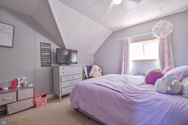 carpeted bedroom featuring ceiling fan and lofted ceiling