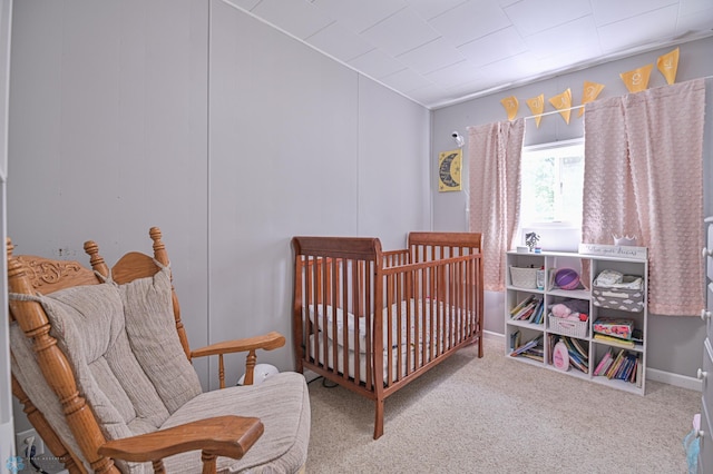 bedroom featuring light colored carpet