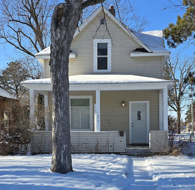 view of front of property featuring covered porch