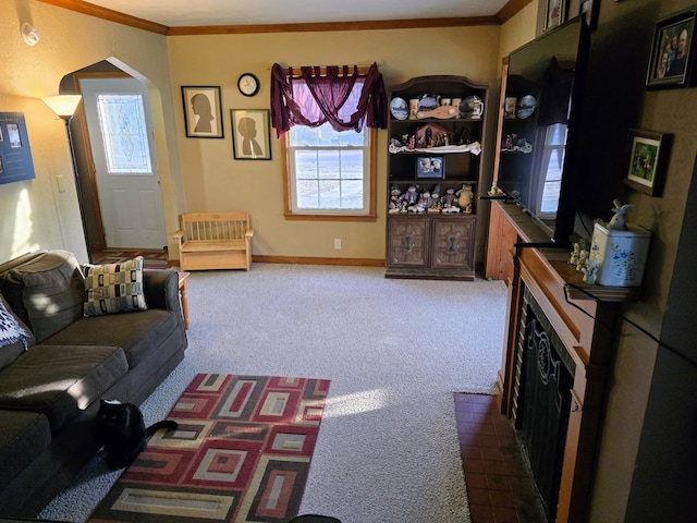 living room with dark carpet and crown molding