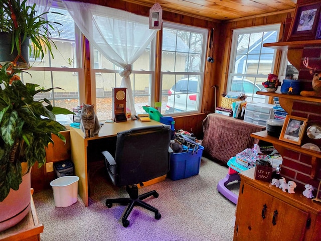 home office with carpet flooring, wooden walls, and wood ceiling