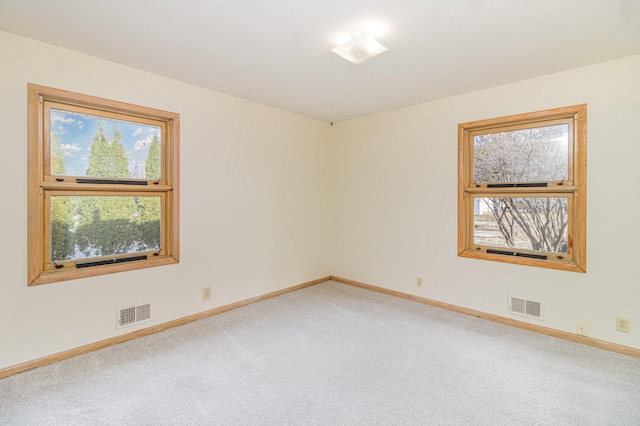 view of carpeted spare room