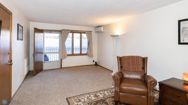 living area featuring a wall mounted AC and light carpet