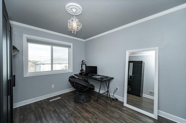 office space featuring visible vents, an inviting chandelier, ornamental molding, and dark wood-style flooring