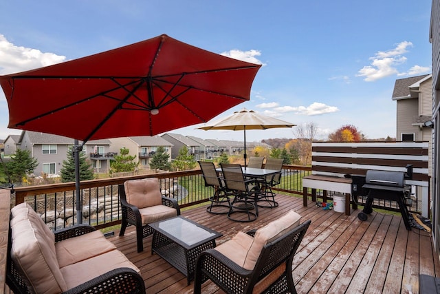 wooden deck featuring an outdoor hangout area