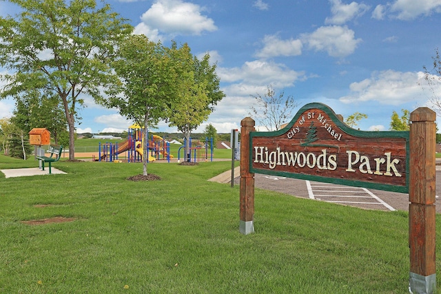 view of community with a playground and a lawn