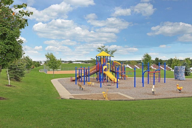 view of playground with a yard