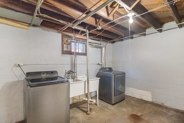 basement featuring separate washer and dryer