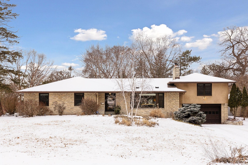 view of front of property with a garage