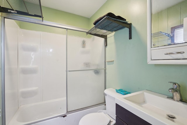 full bathroom featuring vanity, toilet, and enclosed tub / shower combo