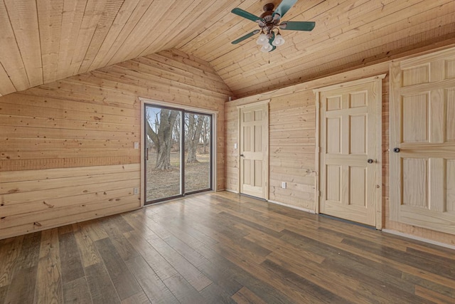 unfurnished bedroom featuring vaulted ceiling, ceiling fan, wooden ceiling, dark hardwood / wood-style floors, and wood walls