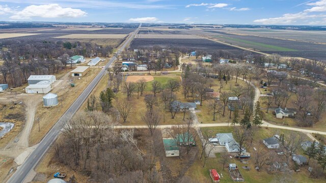 birds eye view of property with a rural view