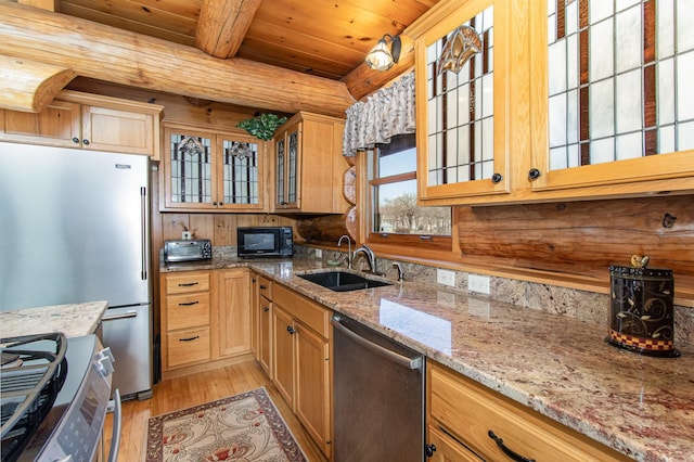 kitchen with sink, stainless steel appliances, light stone counters, wood ceiling, and light wood-type flooring