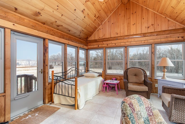 sunroom with vaulted ceiling, plenty of natural light, and wood ceiling