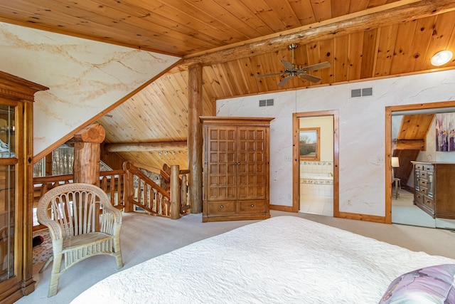 carpeted bedroom featuring lofted ceiling with beams, ensuite bathroom, and wood ceiling