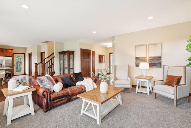 living room with light colored carpet