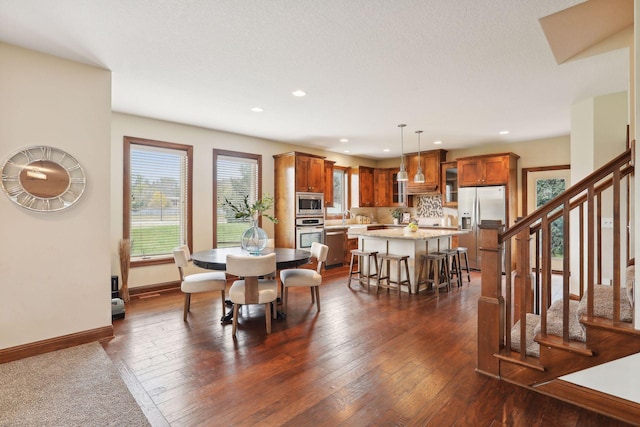 dining room featuring dark hardwood / wood-style flooring