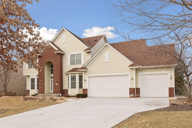 front of property with a garage