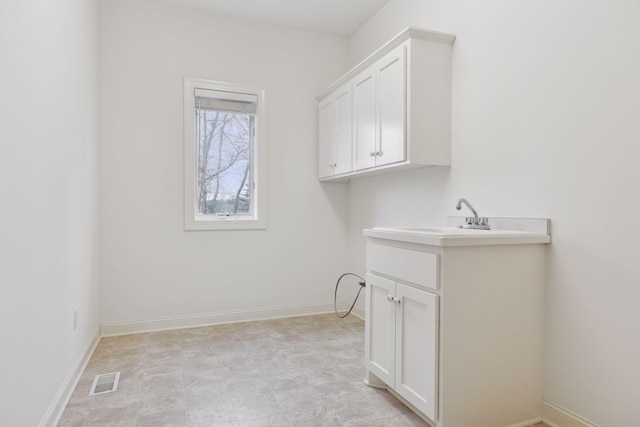 laundry room featuring sink