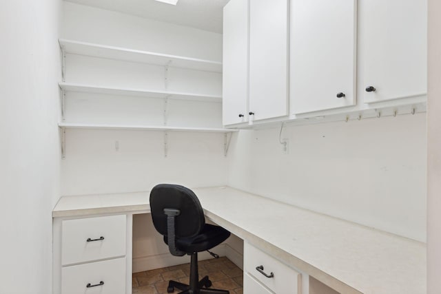 office area featuring built in desk