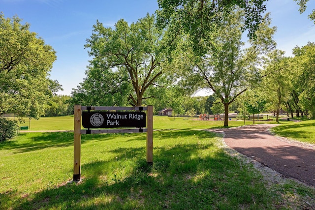 view of home's community featuring a yard