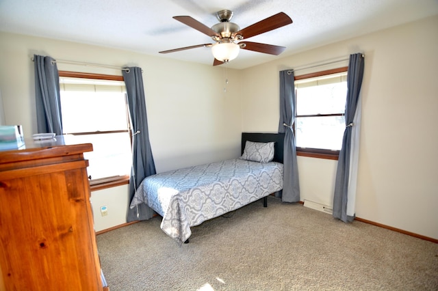 bedroom featuring ceiling fan and carpet flooring