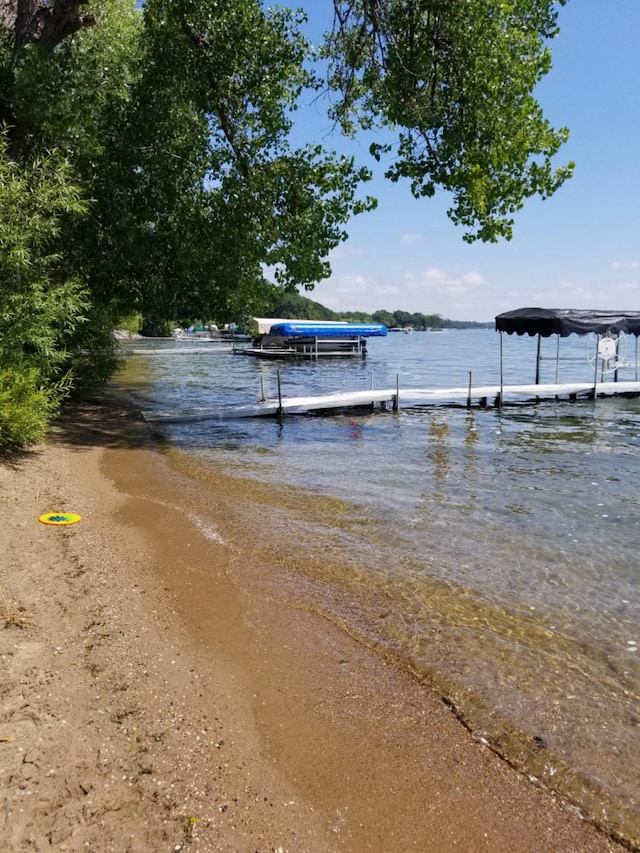 view of dock with a water view