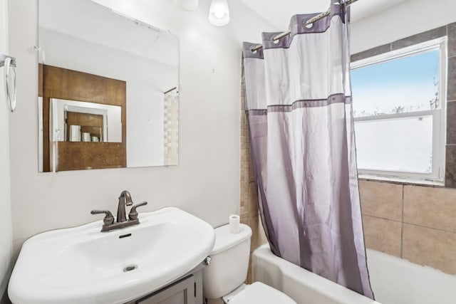 full bathroom with vanity, toilet, and shower / bath combo