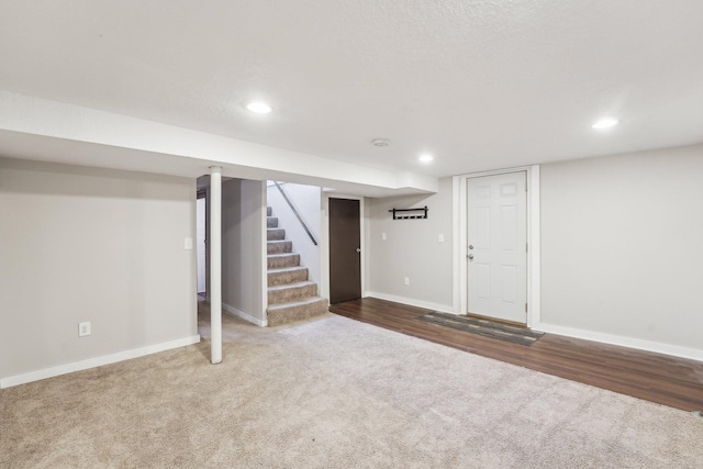 basement with wood-type flooring