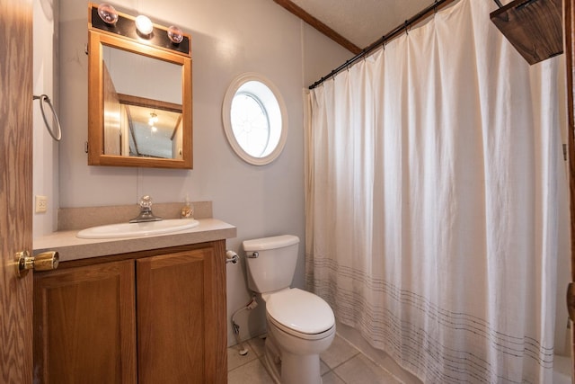 bathroom featuring tile patterned floors, ornamental molding, a textured ceiling, vanity, and toilet