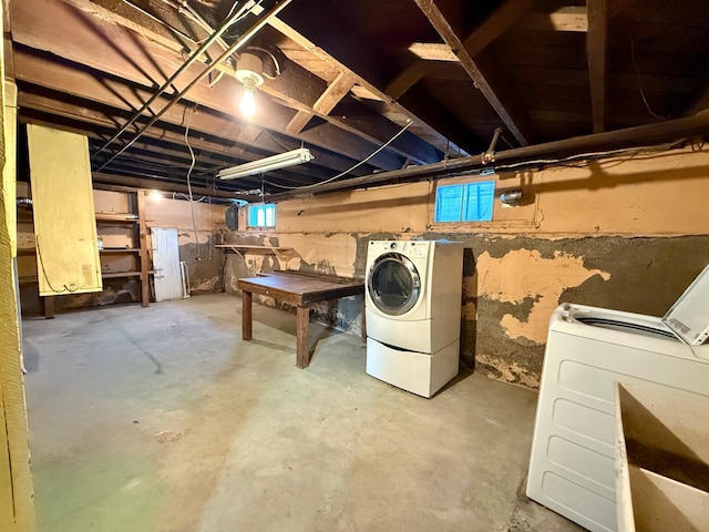 basement featuring washing machine and dryer