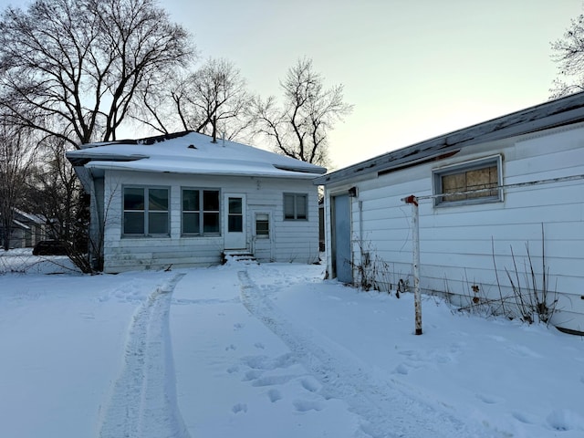 view of snow covered property