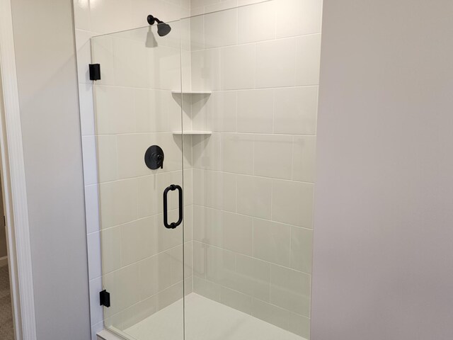 bathroom featuring walk in shower