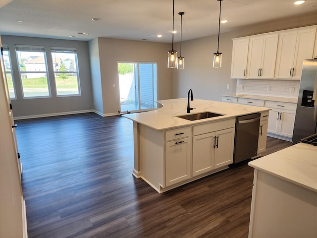 kitchen with dishwasher, pendant lighting, sink, stainless steel fridge with ice dispenser, and white cabinets